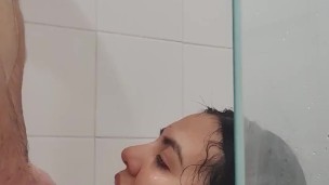 I suck my neighbor’s cock in the shower until he cums in my face
